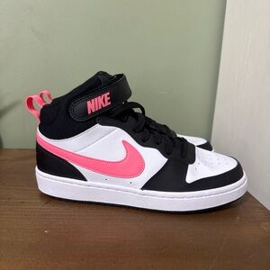 Nike Black and White Shoes with Vibrant Pink Accent
